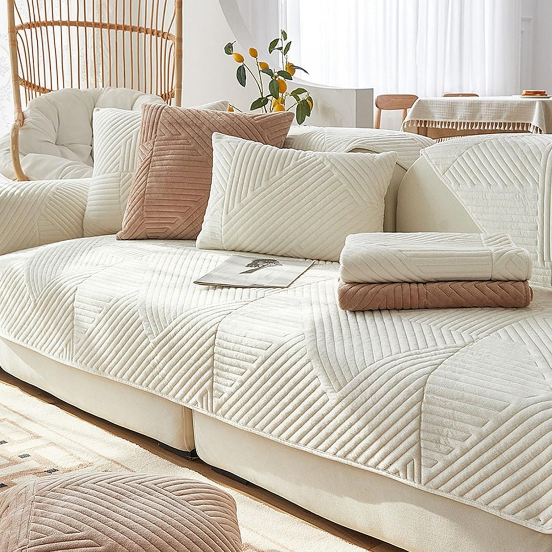 Seduta imbottita con braccioli rivestimento in tessuto beige